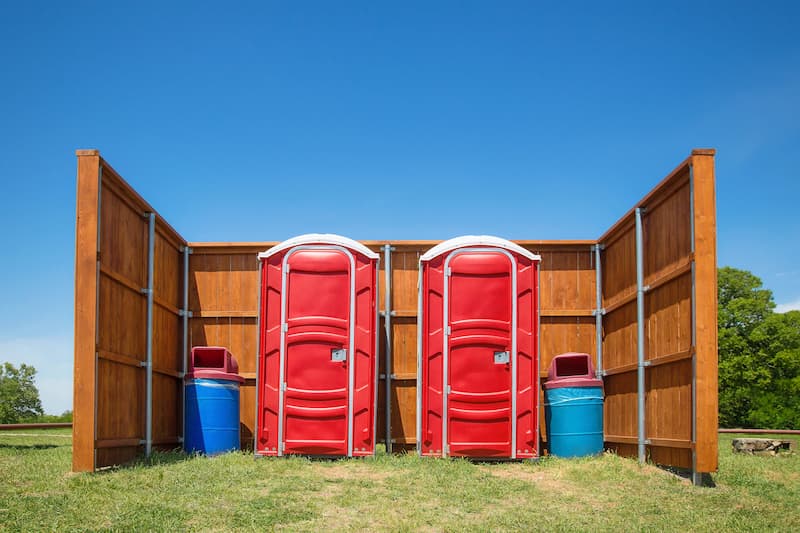 Short-term porta potty units staged for delivery in Centerton, Arkansas